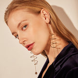Creative Golden Minimalist Rotating Spiral Statement Drop Bead Dangle Earrings