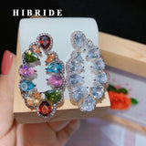 HIBRIDE Elegant Crystal Geometric Design CZ Stone Stud Earrings E-483