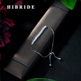 HIBRIDE Luxury Clear White Round Move Stone Bracelet