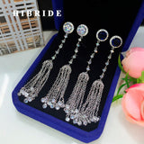 HIBRIDE Blue Round Cubic Zirconia Tassel Drop Earring E-549