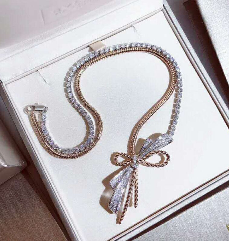 Two-color bow necklace