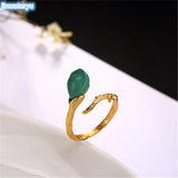 jinwateryu 925 Sterling silver unique ring green stone