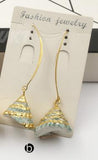 WT-E523 Gold Trim Natural Cone Shape Sea Shell With Full Gold Dipped Earrings