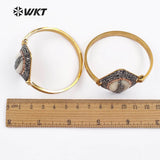 WT-RB034 WKT Cowrie Shell Bangle With Gold Color Plated Shell With Full Rhinestone Paved Evil Eye