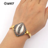WT-RB034 WKT Cowrie Shell Bangle With Gold Color Plated Shell With Full Rhinestone Paved Evil Eye